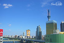 （写真合成）東京スカイツリーに見とれるうまビル